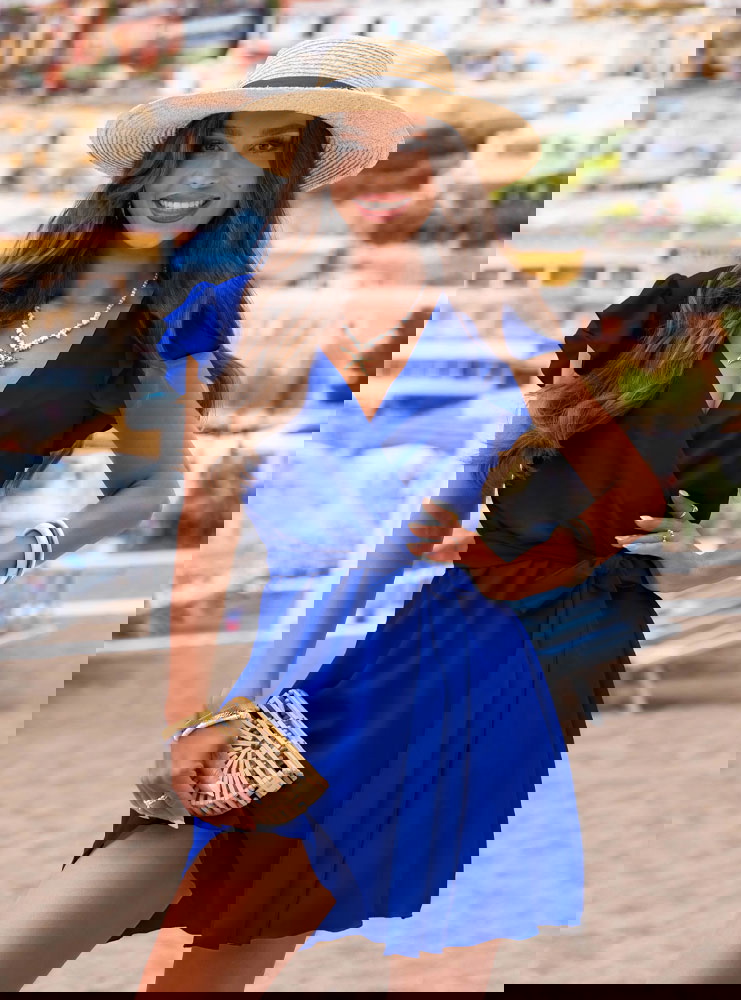 Chabrowa sukienka z przekładanym...