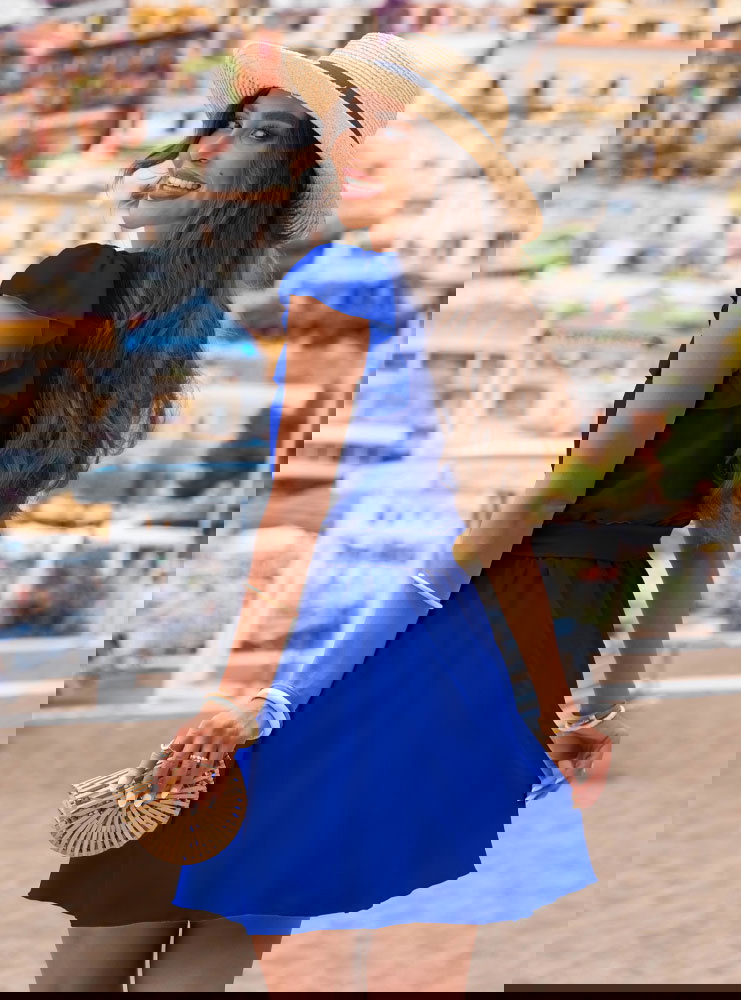 Chabrowa sukienka z przekładanym...