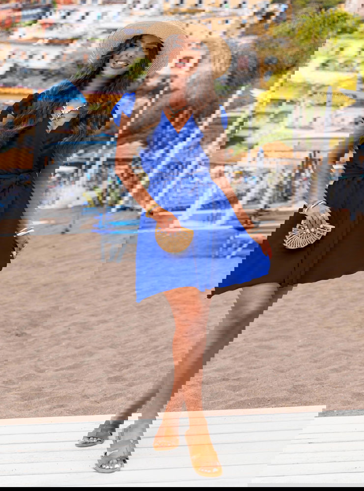 Chabrowa sukienka z przekładanym...