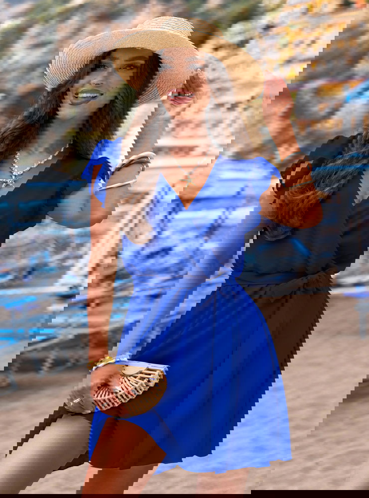 Chabrowa sukienka z przekładanym...