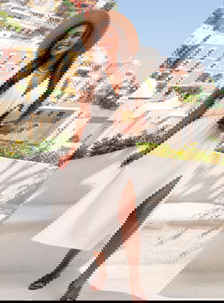 Biała muślinowa sukienka z...