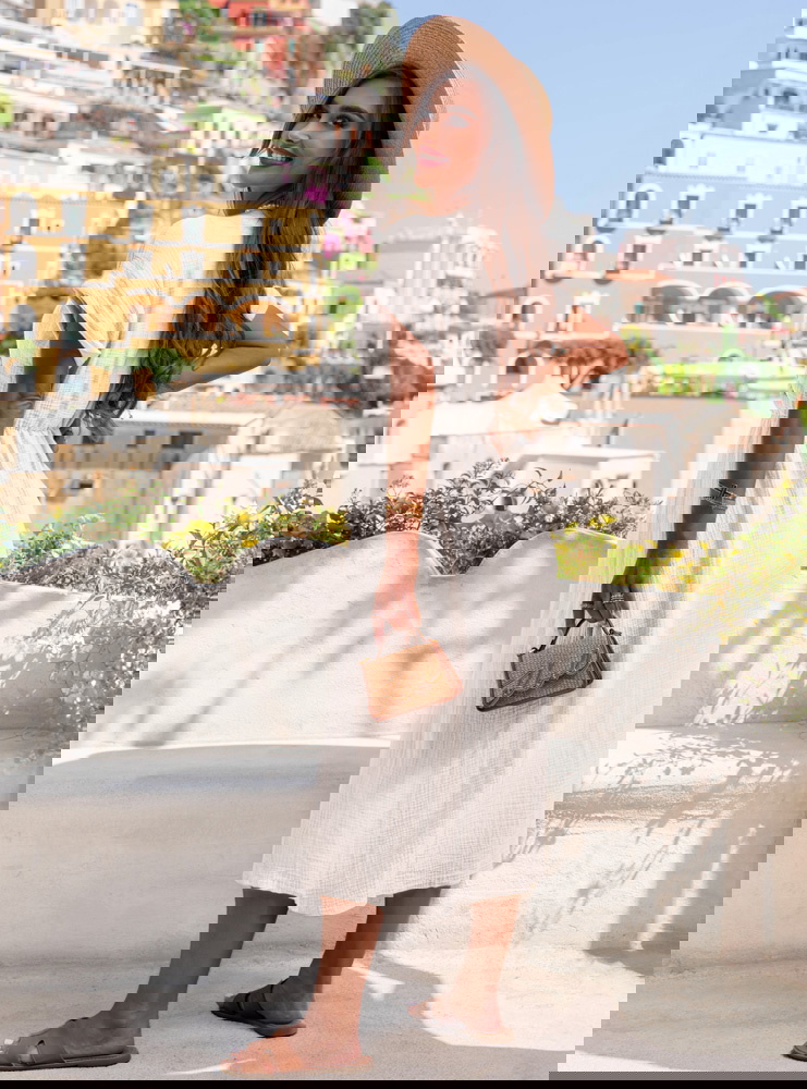 Biała muślinowa sukienka z...