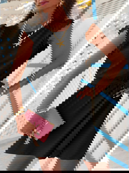 Czarna sukienka z wiązaniem... 2