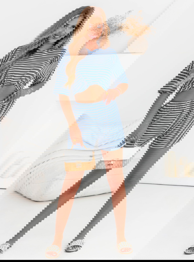 Niebieski komplet w paski bluzka i...