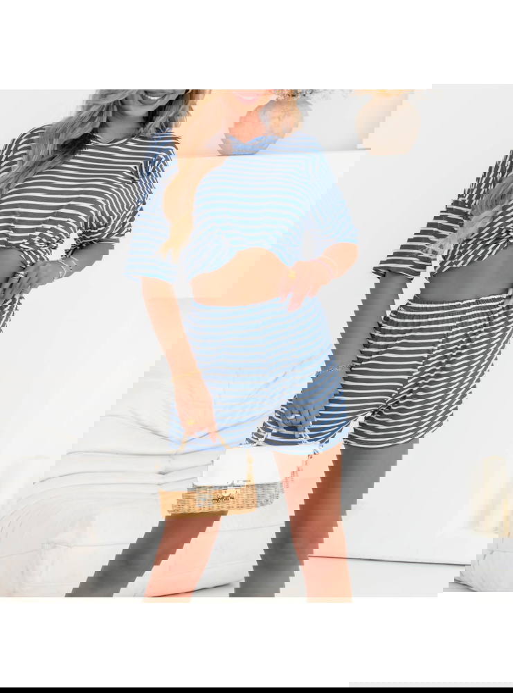 Niebieski komplet w paski bluzka i...