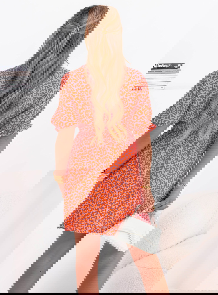 Muślinowa sukienka z przekładanym...