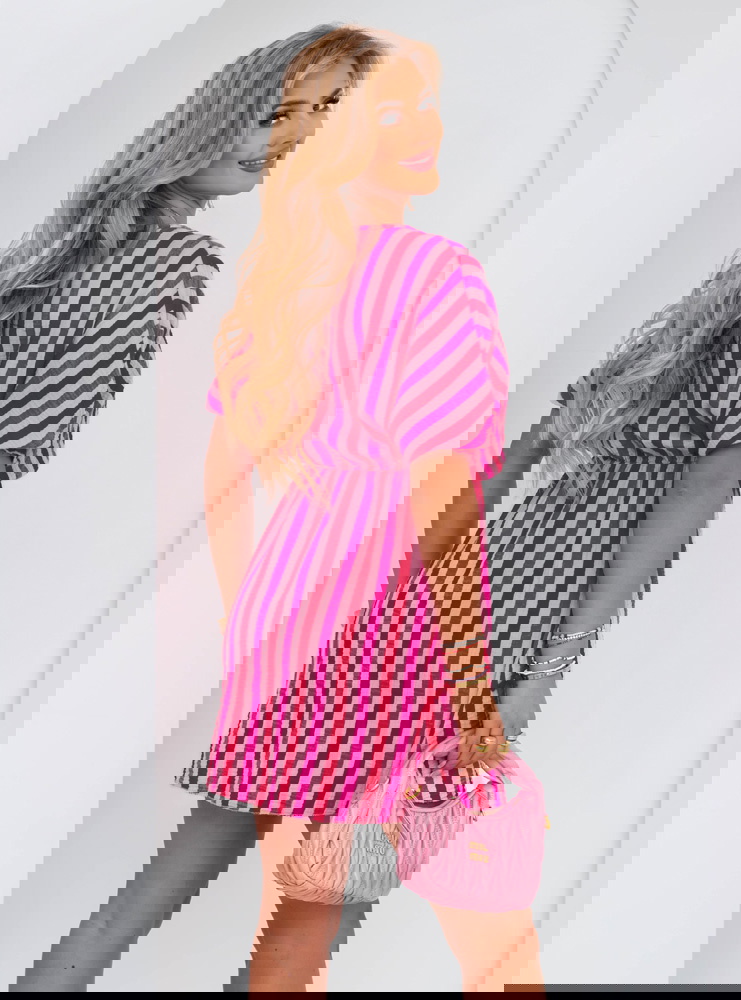 Muślinowa sukienka z przekładanym...