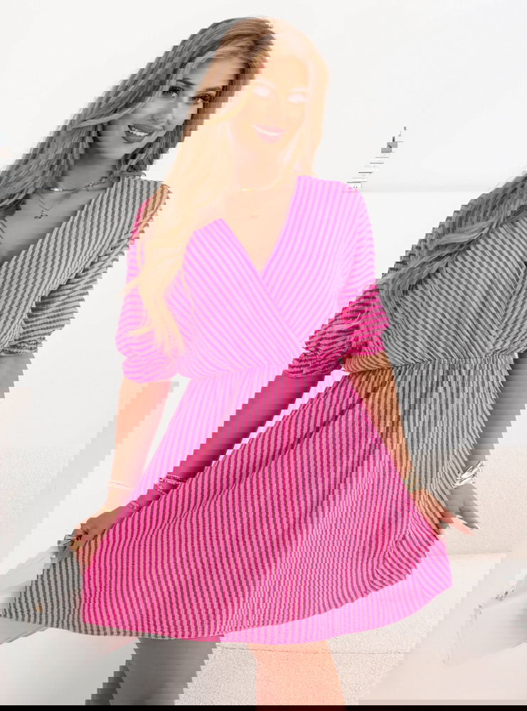 Muślinowa sukienka z przekładanym...