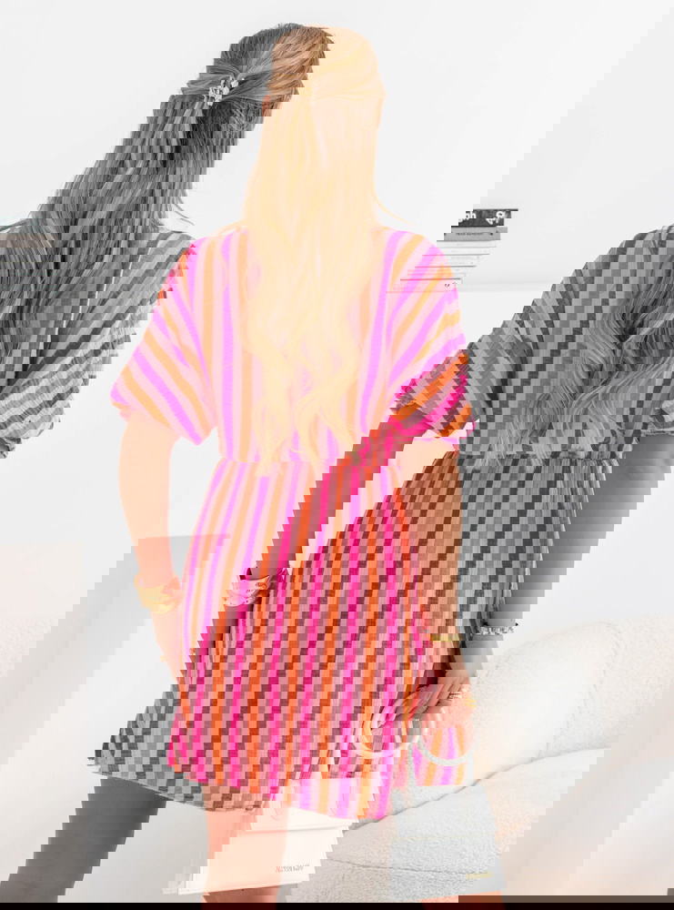 Muślinowa sukienka z przekładanym...