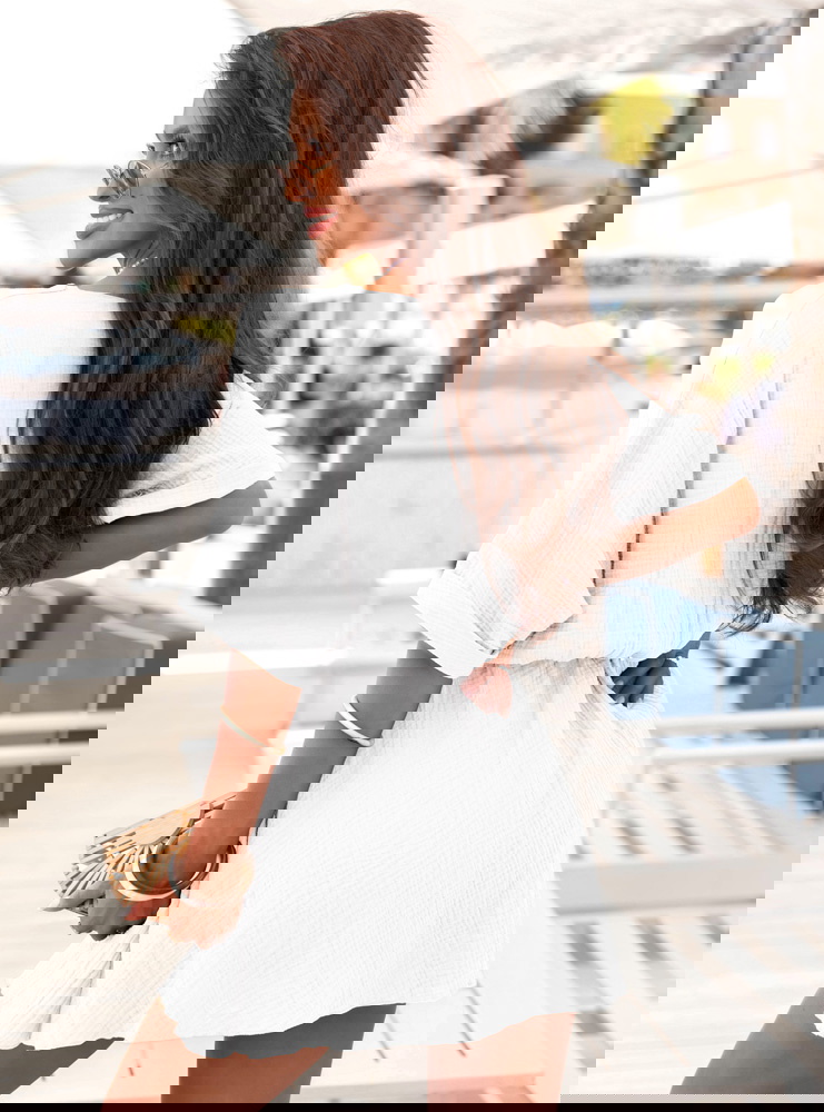 Biały muślinowy kombinezon z...