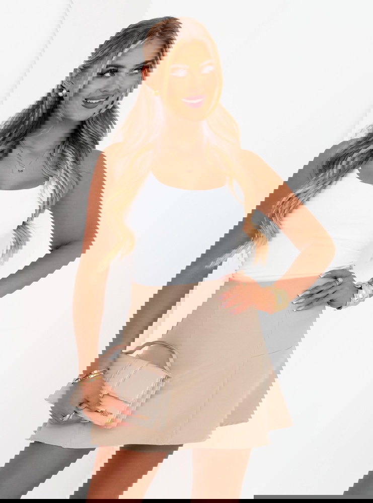 Beżowa rozkloszowana spódniczka mini...