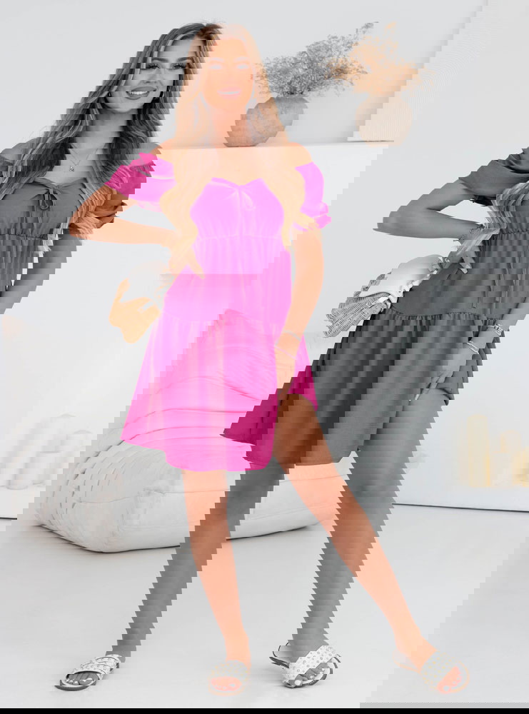 Sukienka mini z wiązanym dekoltem...