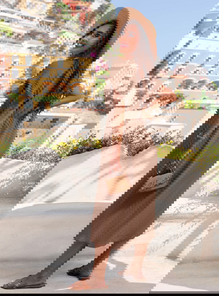 Muślinowa sukienka z przekładanym...