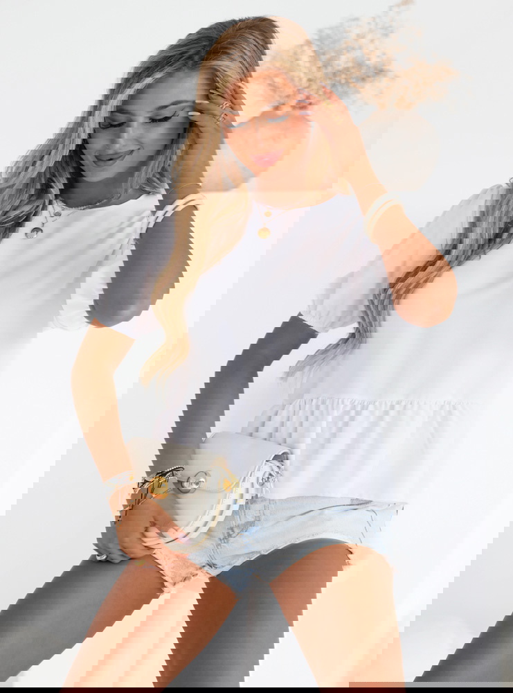 Biała bluzka z ozdobnym wiązaniem na...