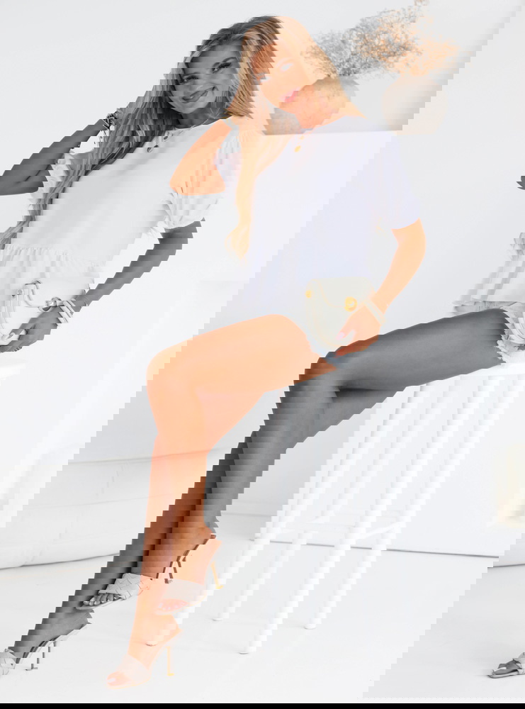 Biała bluzka z ozdobnym wiązaniem na...