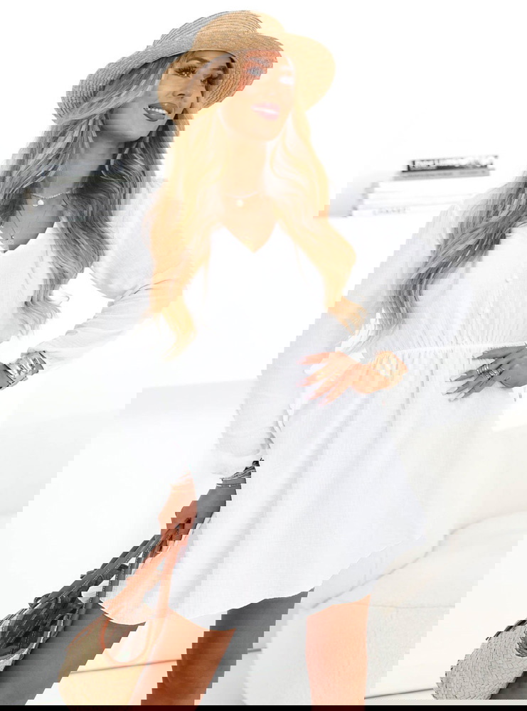 Biała muślinowa rozkloszowana...