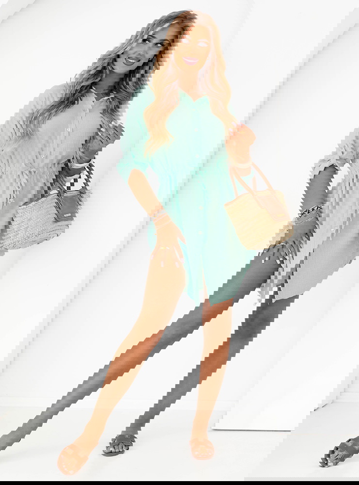 Miętowa sukienka zapinana na guziki...