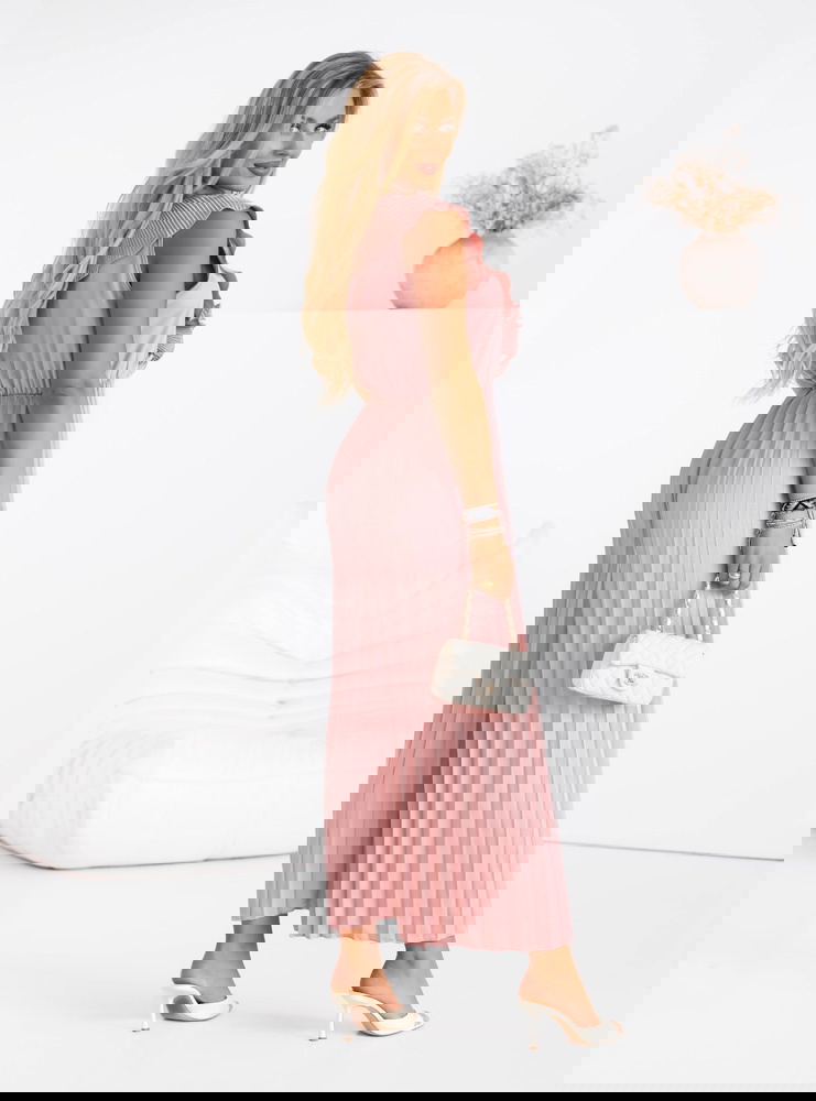 Plisowany kombinezon z falbankami...