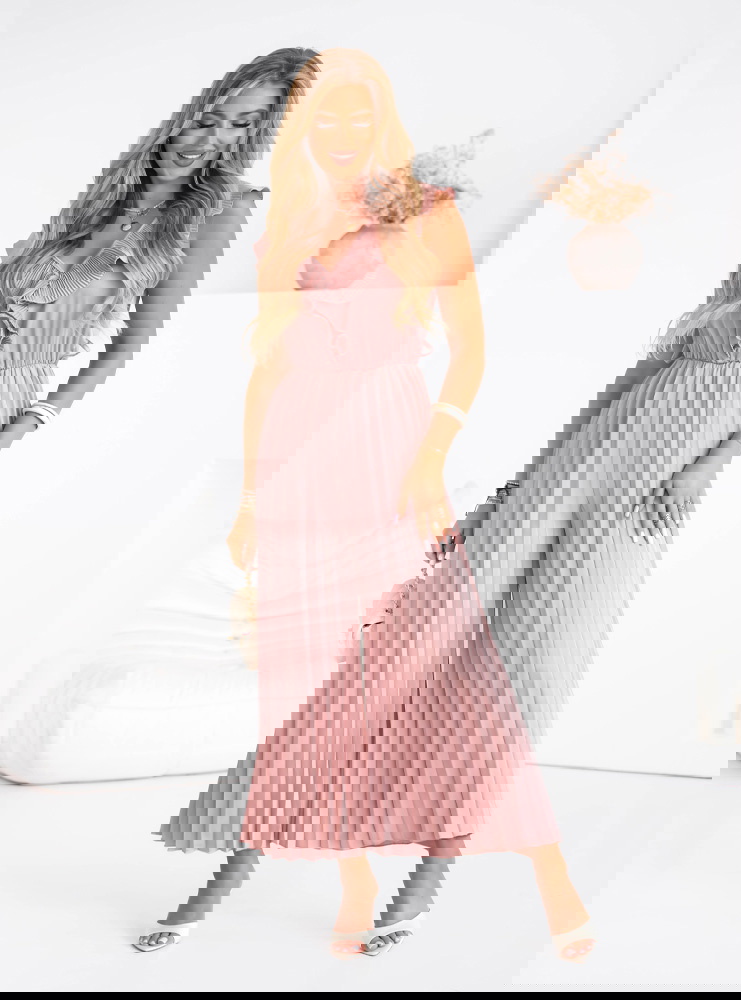 Plisowany kombinezon z falbankami...