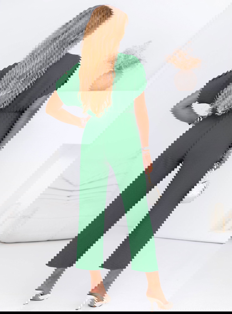 Kombinezon z guzikami na krótki rękaw...