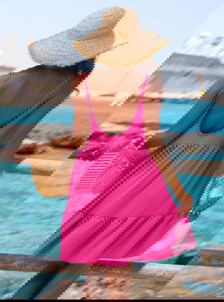 Rozkloszowana sukienka na ramiączkach...