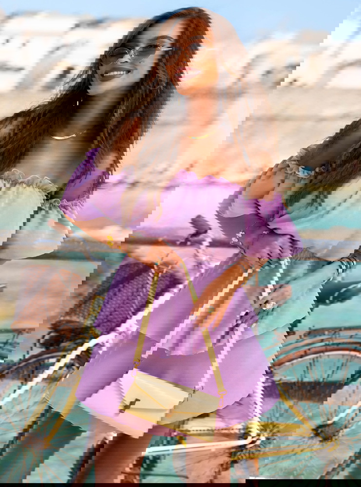 Liliowy kombinezon jak sukienka z...