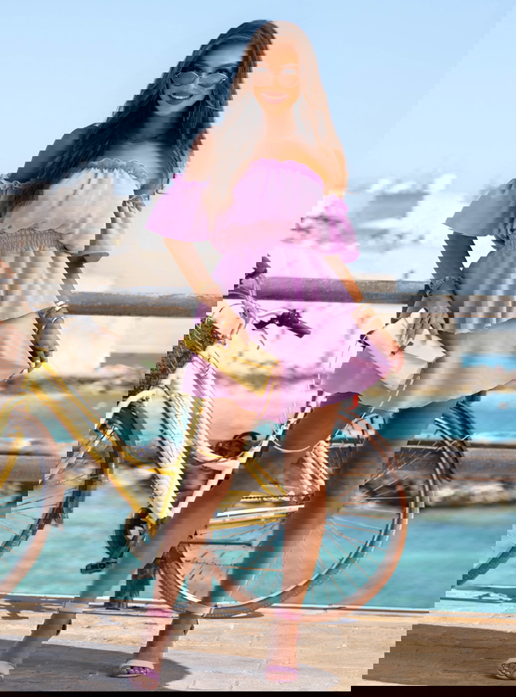 Liliowy kombinezon jak sukienka z...