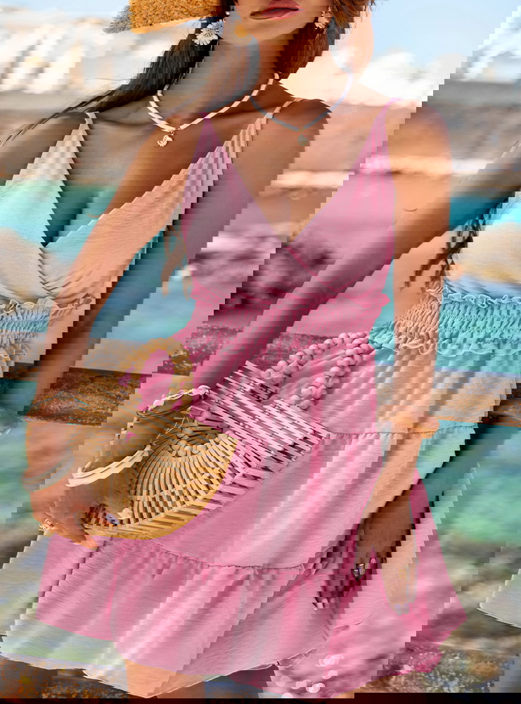 Pudrowa rozkloszowana sukienka na...