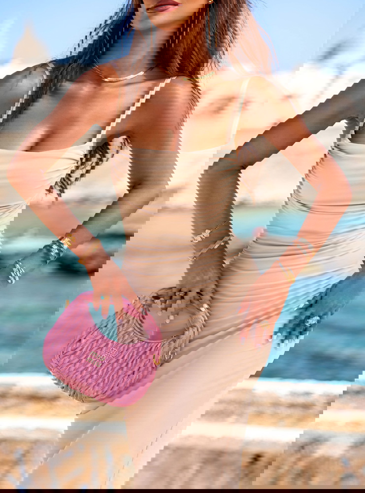 Beżowa długa sukienka na ramiączkach...