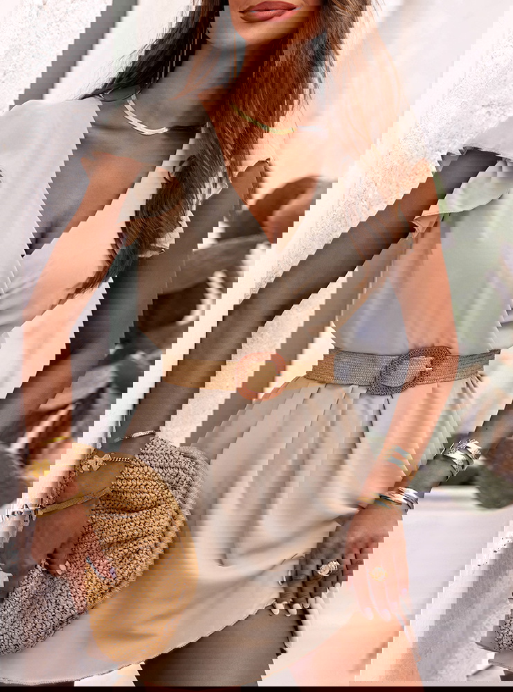 Beżowa sukienka z przekładanym...