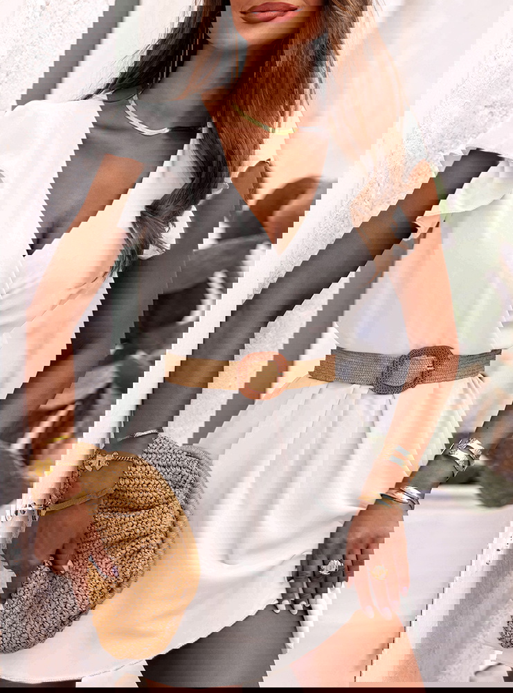 Biała sukienka z przekładanym...