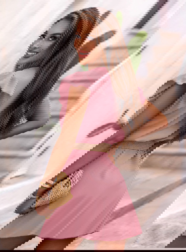 Sukienka z przekładanym dekoltem...