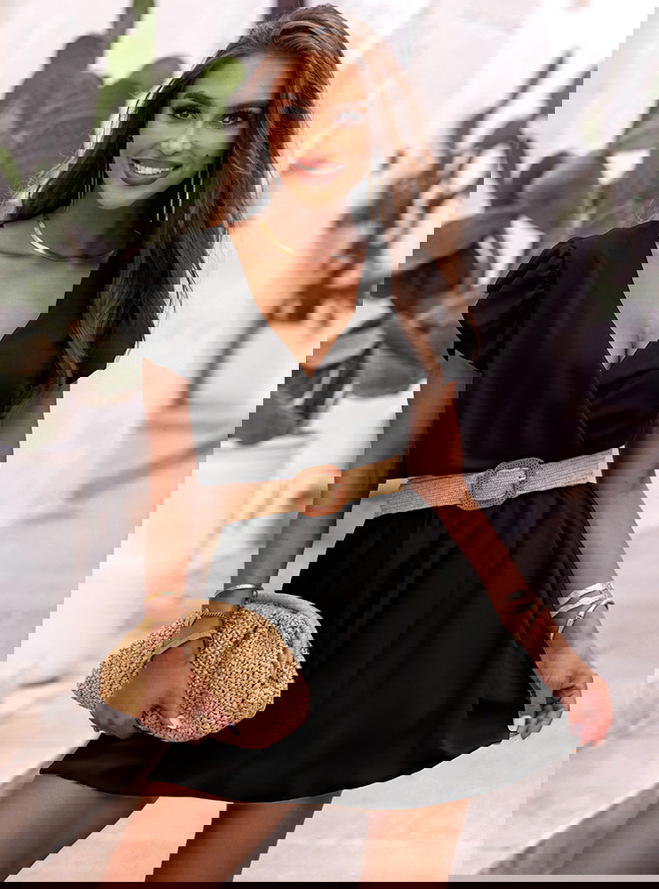 Czarna sukienka z przekładanym...