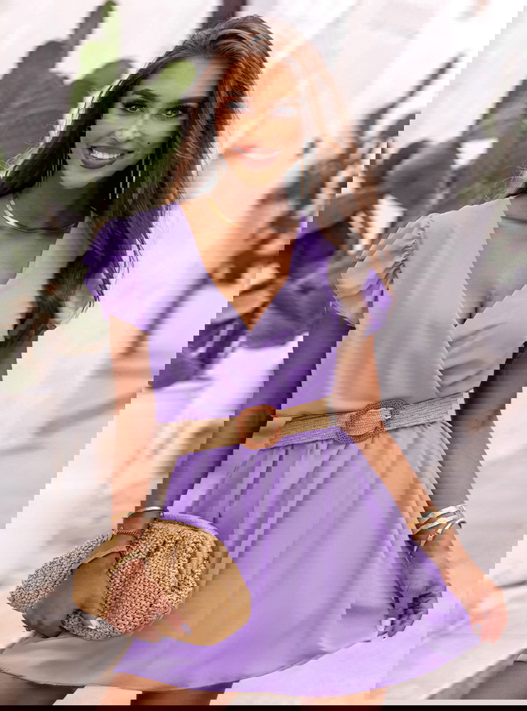 Liliowa sukienka z przekładanym...