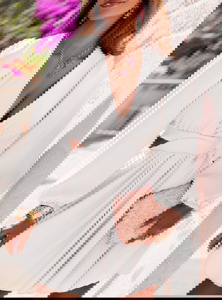 Biała sukienka rozkloszowana z...