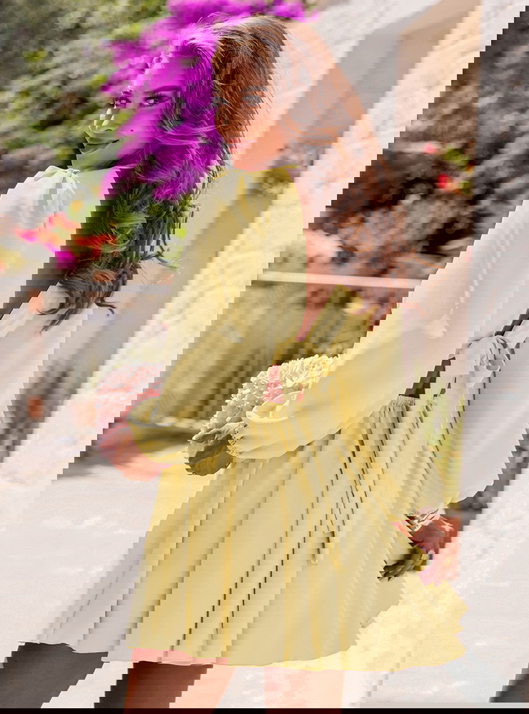 Sukienka rozkloszowana z wycięciem...