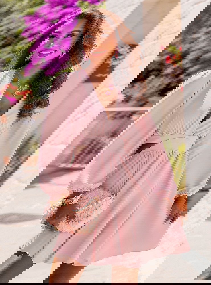 Pudrowa sukienka rozkloszowana z...