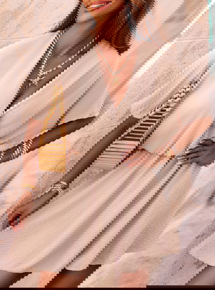 Beżowy kombinezon jak sukienka z...