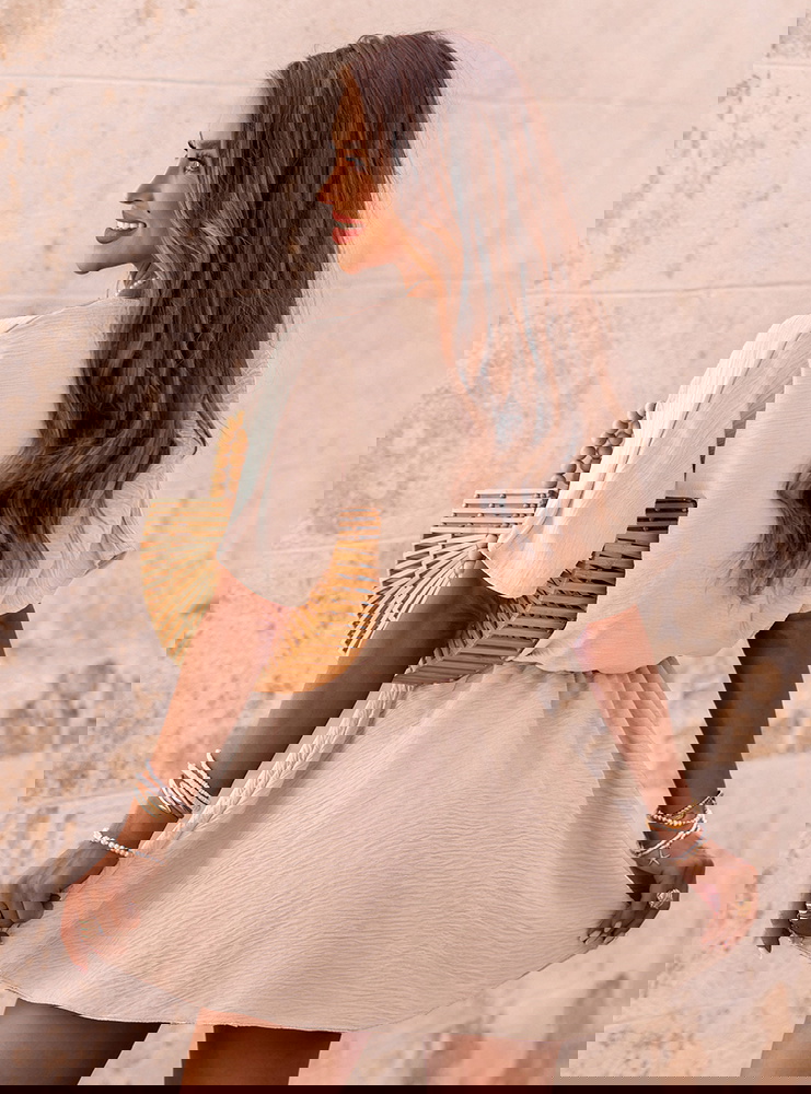 Beżowy kombinezon jak sukienka z...