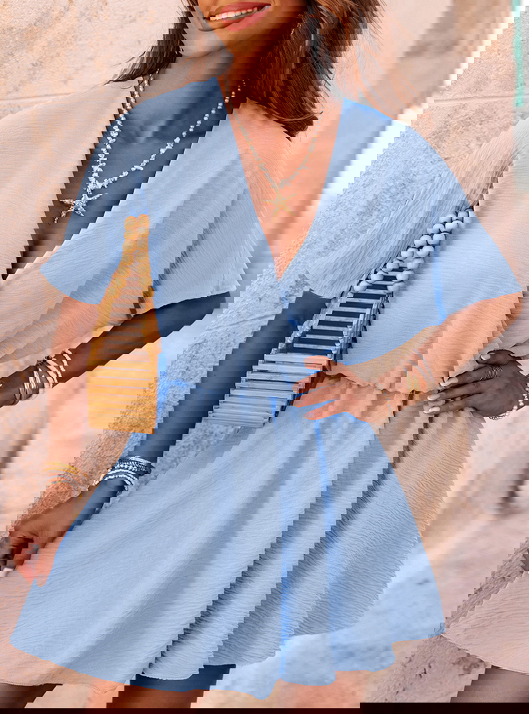 Błękitny kombinezon jak sukienka z...