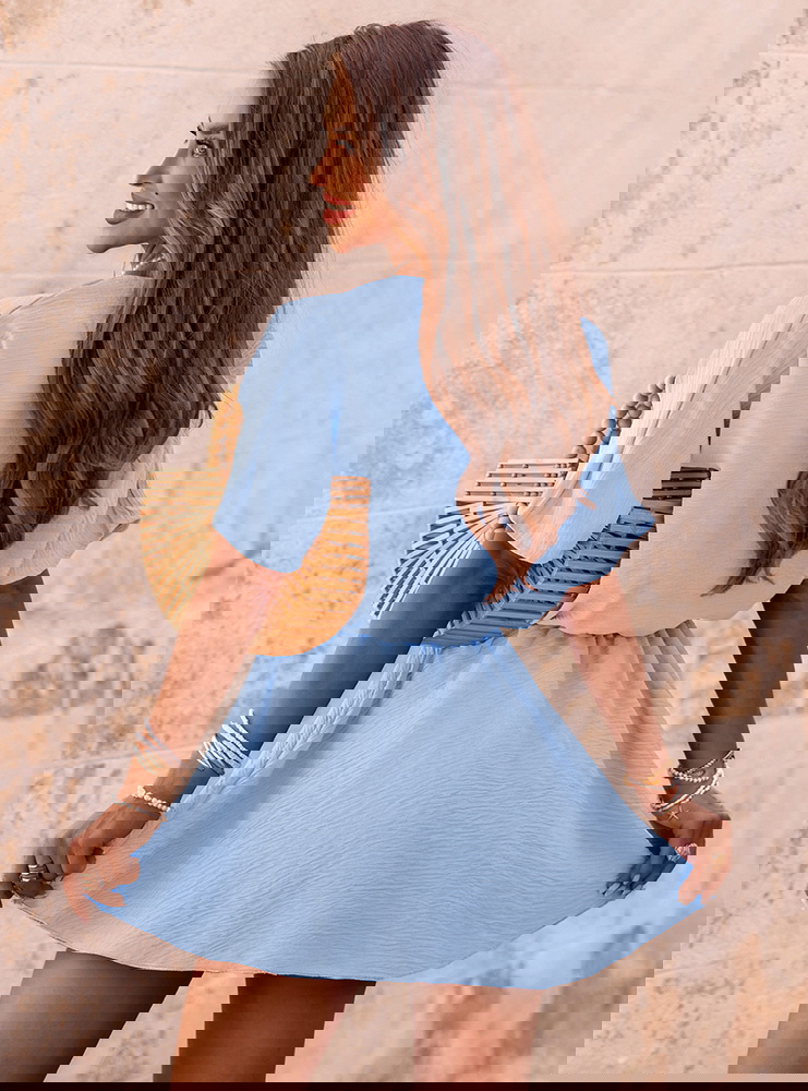 Błękitny kombinezon jak sukienka z...