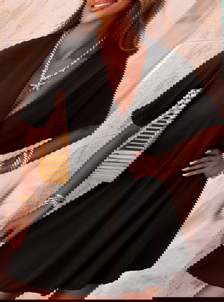 Czarny kombinezon jak sukienka z...