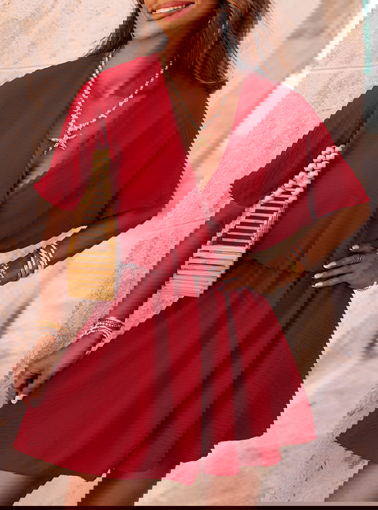 Malinowy kombinezon jak sukienka z...