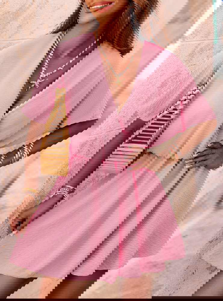 Pudrowy kombinezon jak sukienka z...