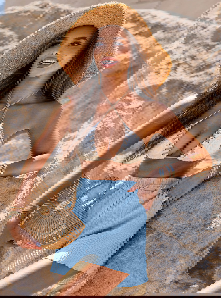 Błękitne luźne spodenki z kieszeniami...