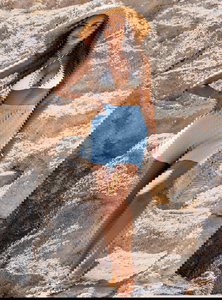 Błękitne luźne spodenki z kieszeniami...