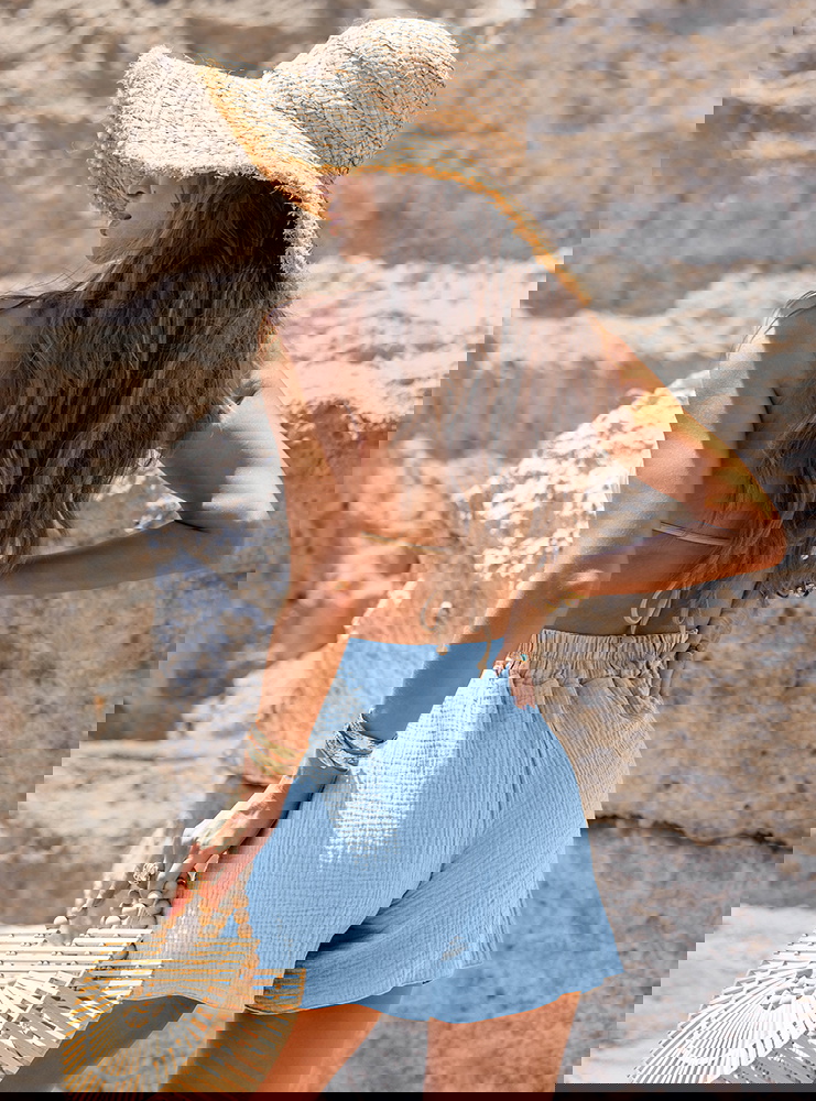 Błękitne luźne spodenki z kieszeniami...