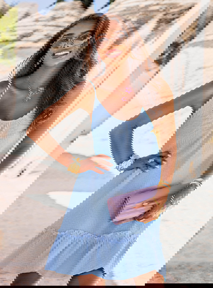 Błękitna rozkloszowana sukienka mini...