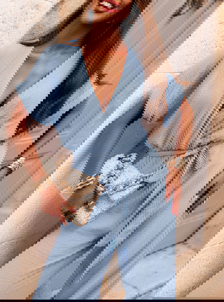 Błękitny kombinezon z długimi...