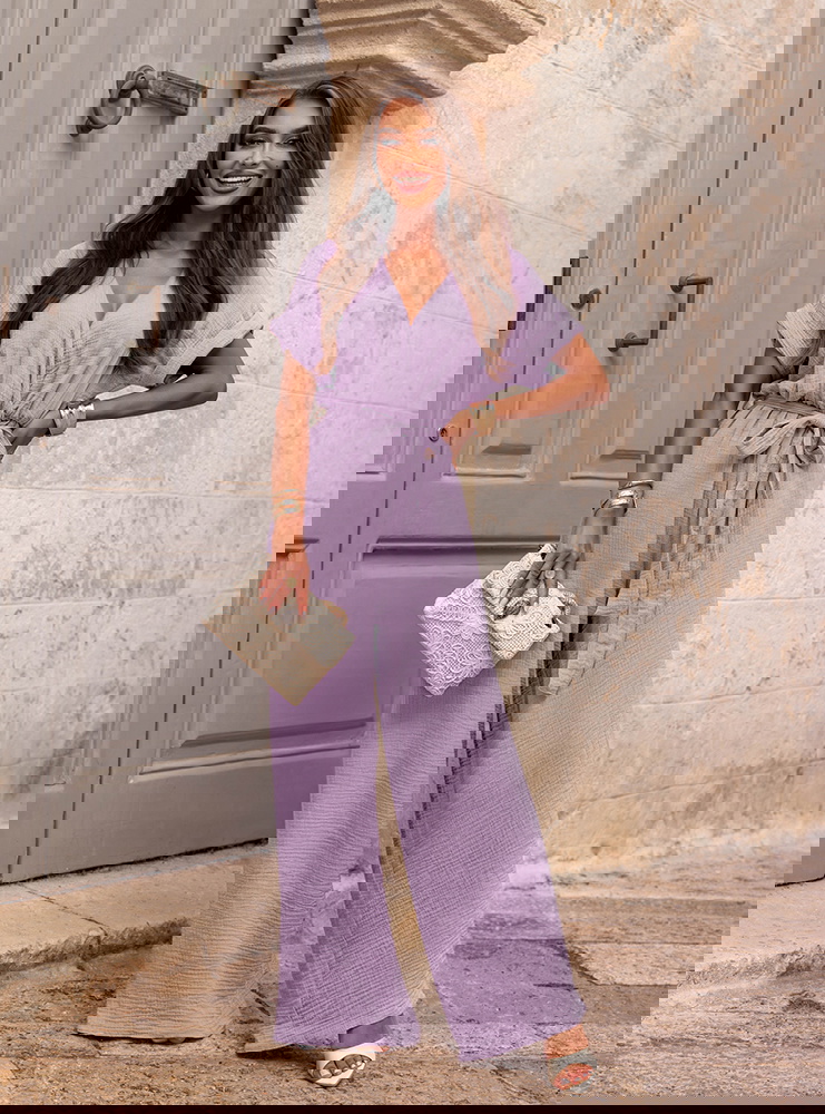 Liliowy kombinezon z długimi...